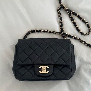 CHANEL Black Quilted Crossbody Bag with Gold Accents Mini Flap